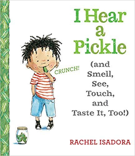 I hear a pickle (and smell, see, touch, and taste it, too!) = Oigo un pepinillo (¡y también lo huelo, veo, toco, y saboreo!) 