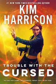 Trouble with the cursed : Hollows Cover Image